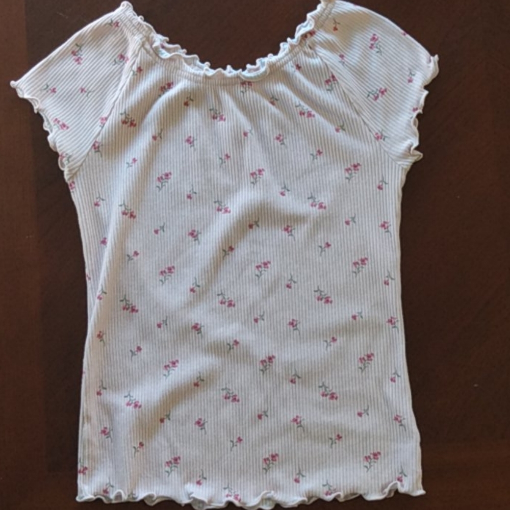 A light pink floral shirt